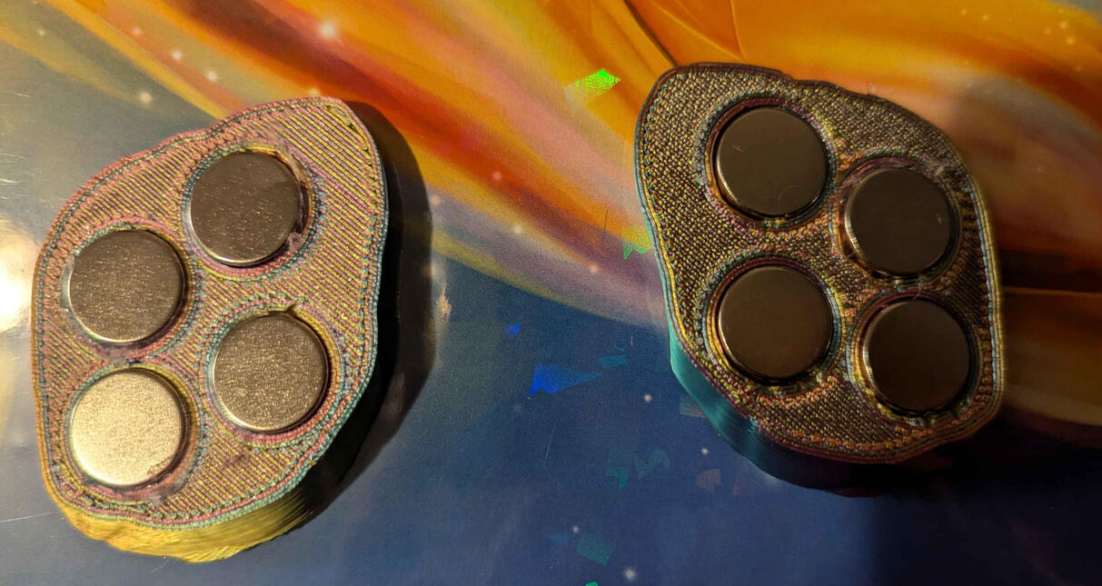 printed base, exposed magnets